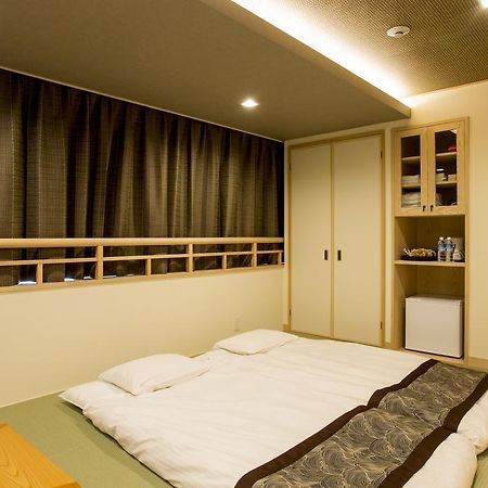 東心斎橋おおきにアパート Ookini Ryokan & Apartment Osaka Esterno foto