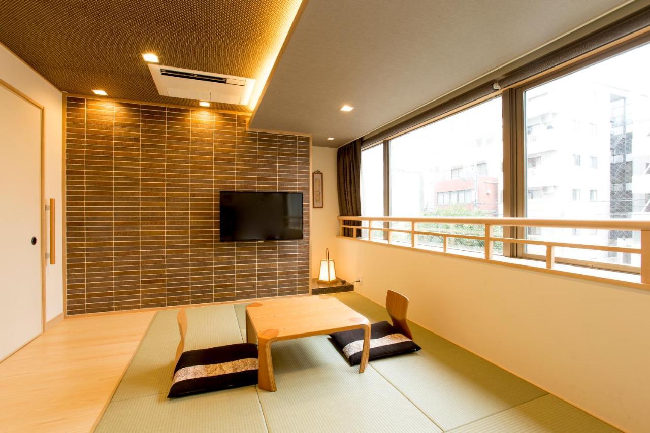 東心斎橋おおきにアパート Ookini Ryokan & Apartment Osaka Esterno foto