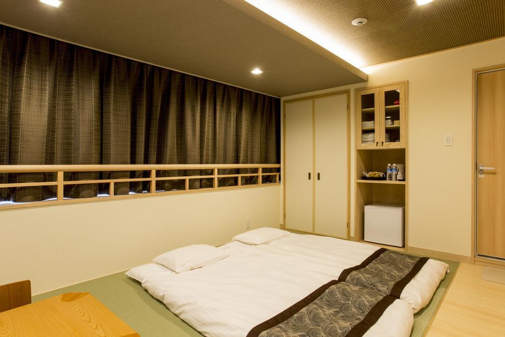 東心斎橋おおきにアパート Ookini Ryokan & Apartment Osaka Esterno foto