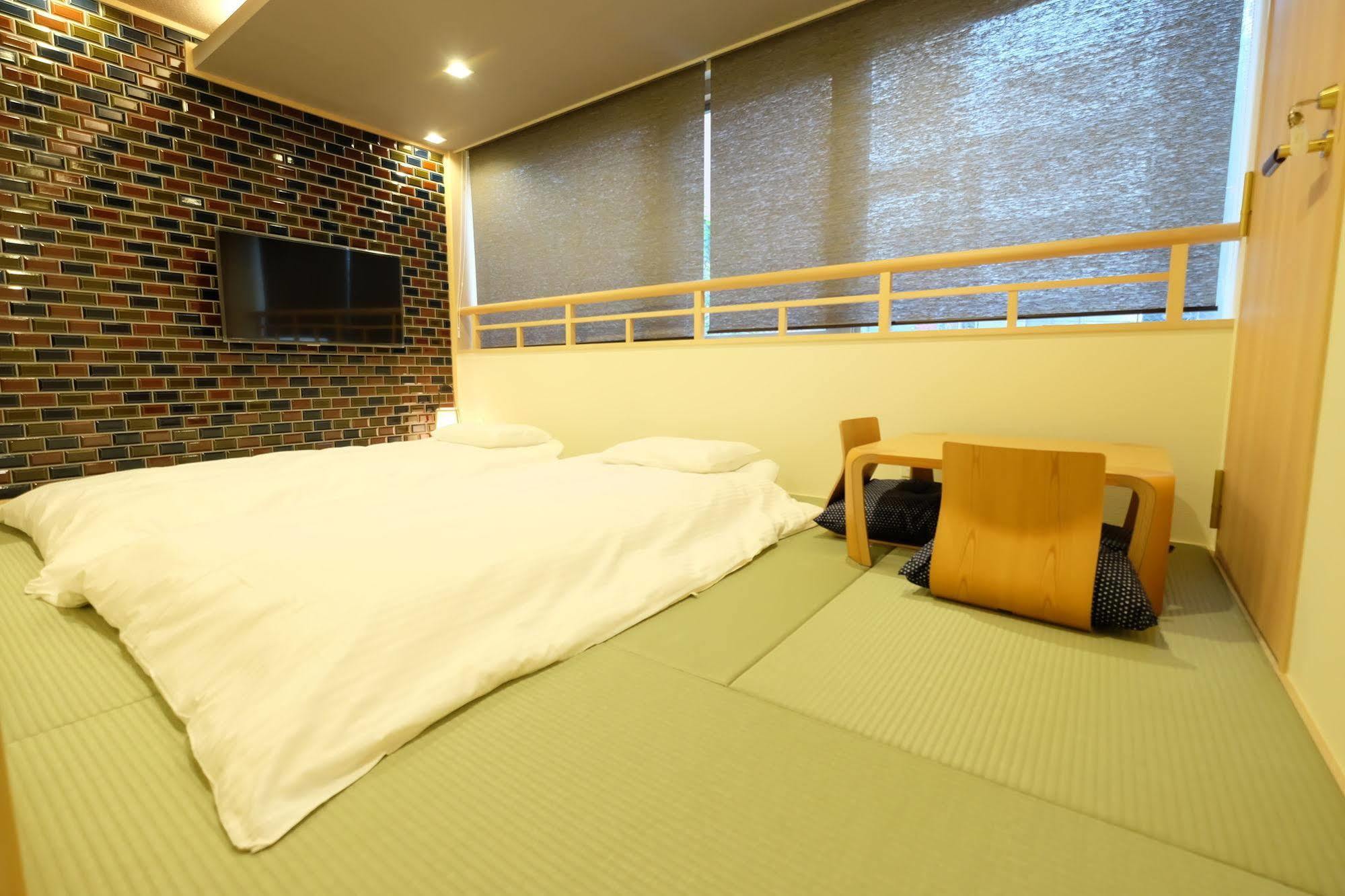 東心斎橋おおきにアパート Ookini Ryokan & Apartment Osaka Esterno foto