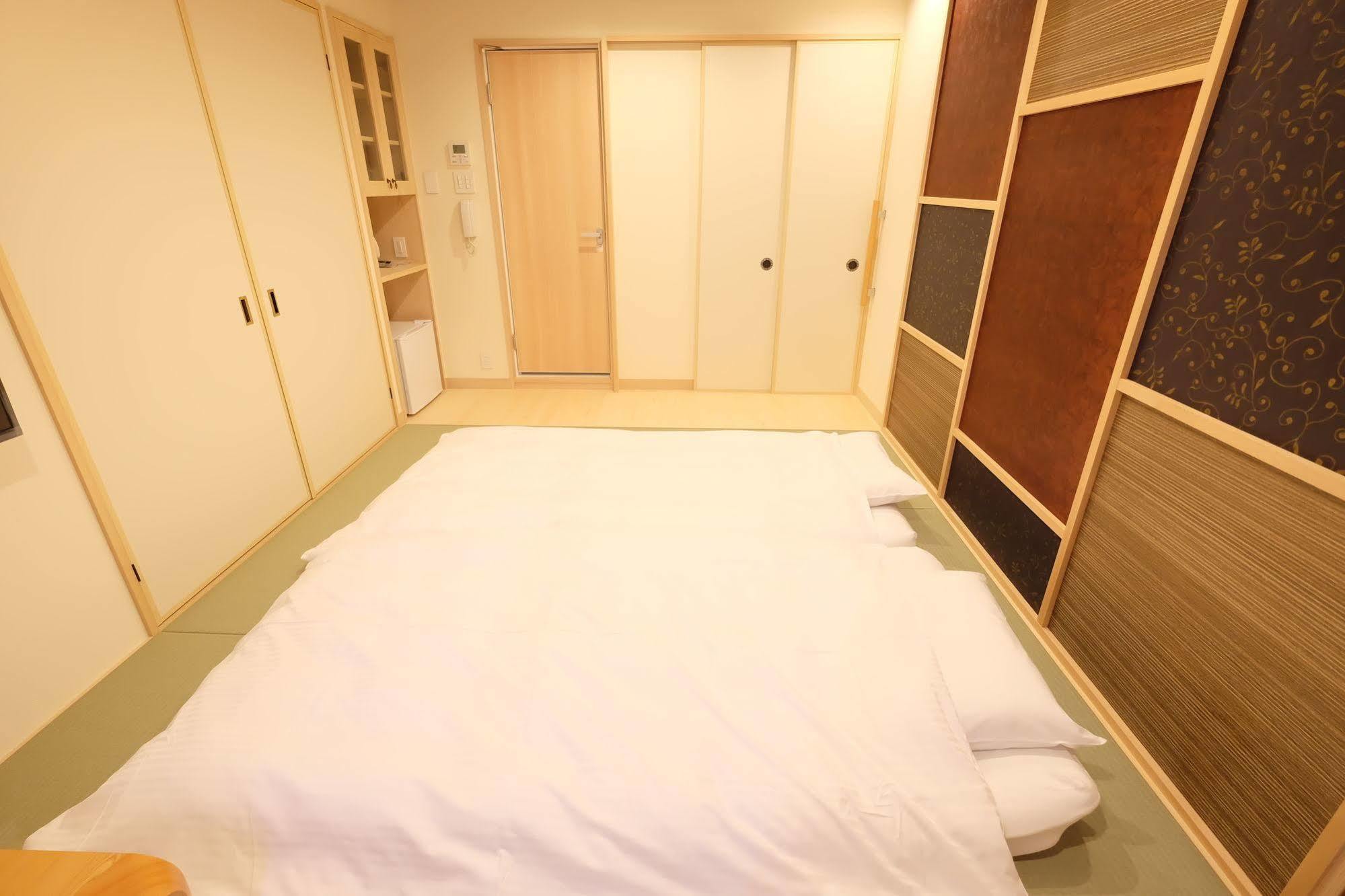 東心斎橋おおきにアパート Ookini Ryokan & Apartment Osaka Esterno foto