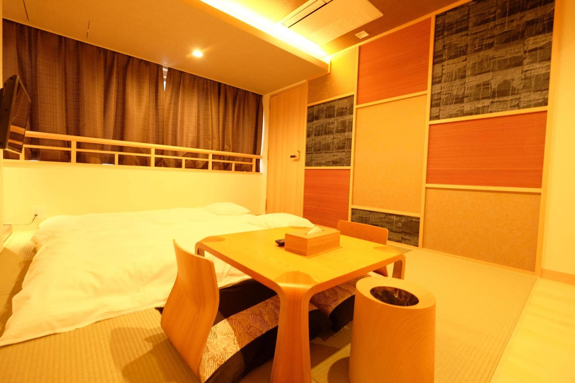 東心斎橋おおきにアパート Ookini Ryokan & Apartment Osaka Esterno foto